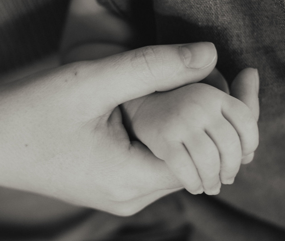 New mother's hands with brittle nails