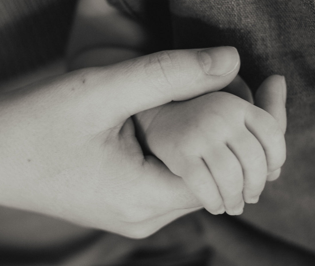 New mother's hands with brittle nails